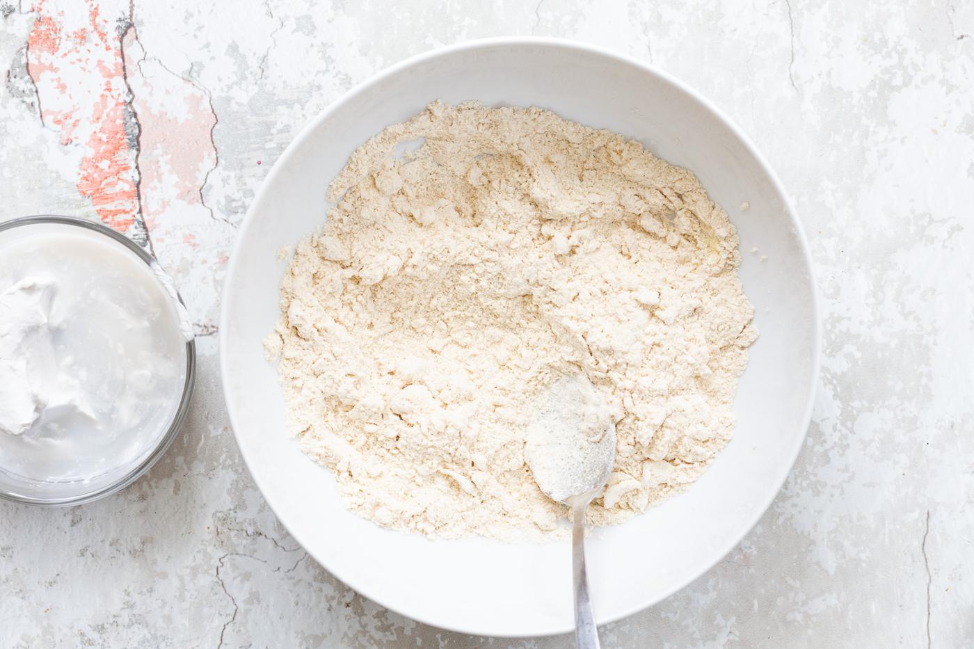 Ingredients for the crust of our Vegan Strawberry Galette in white bowl
