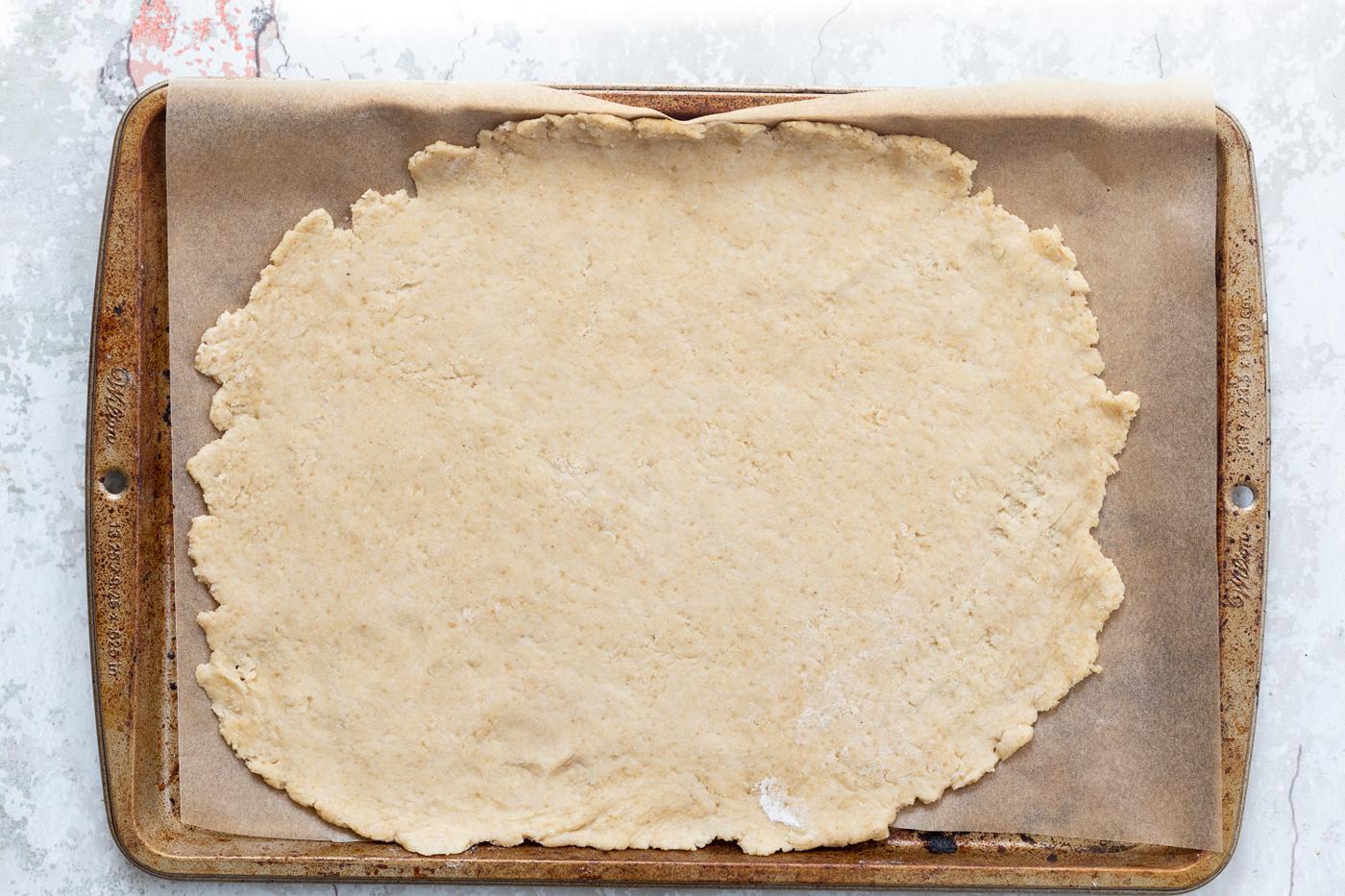 Dough for our Vegan Strawberry Galette on parchment