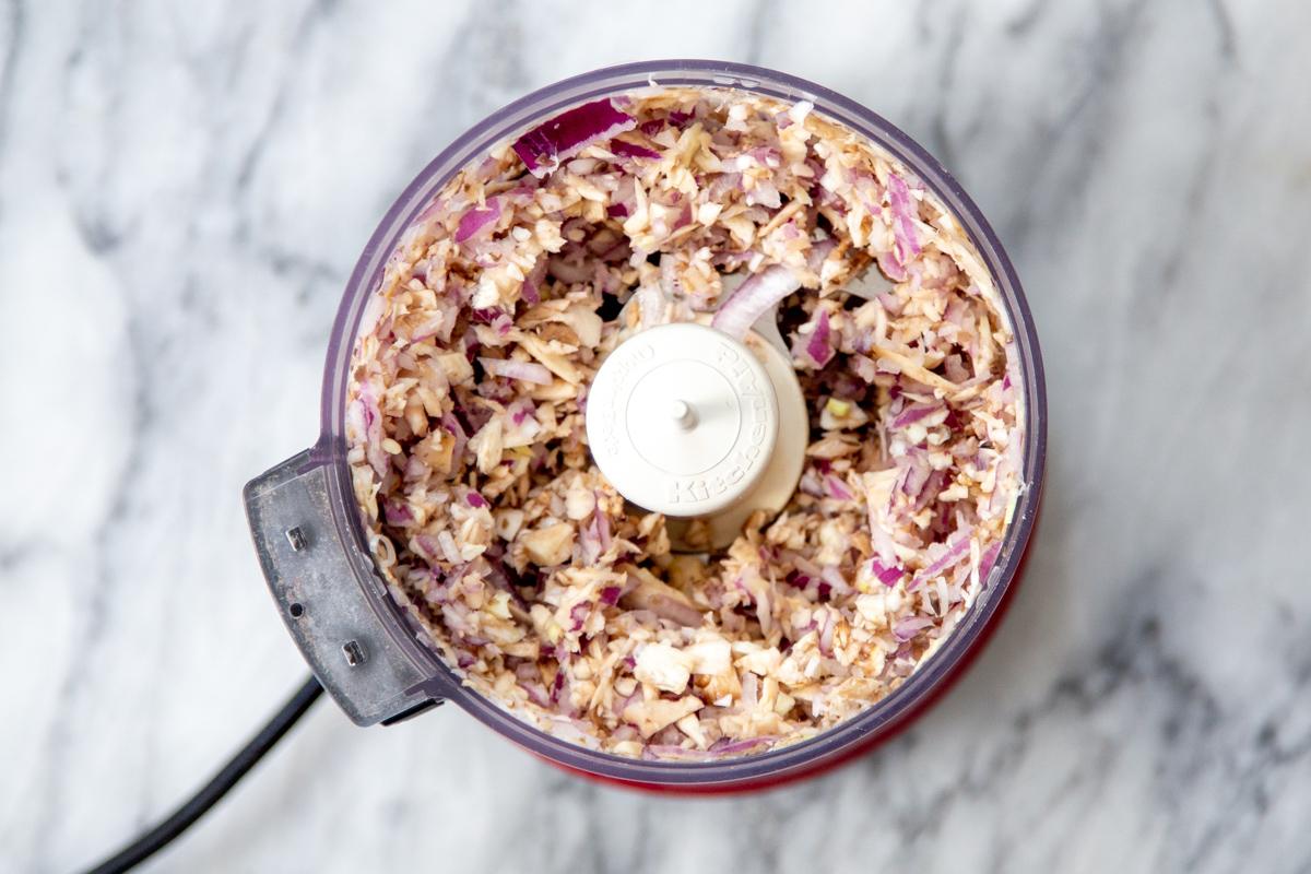 chopped onion, garlic and mushroom stems in a food processor