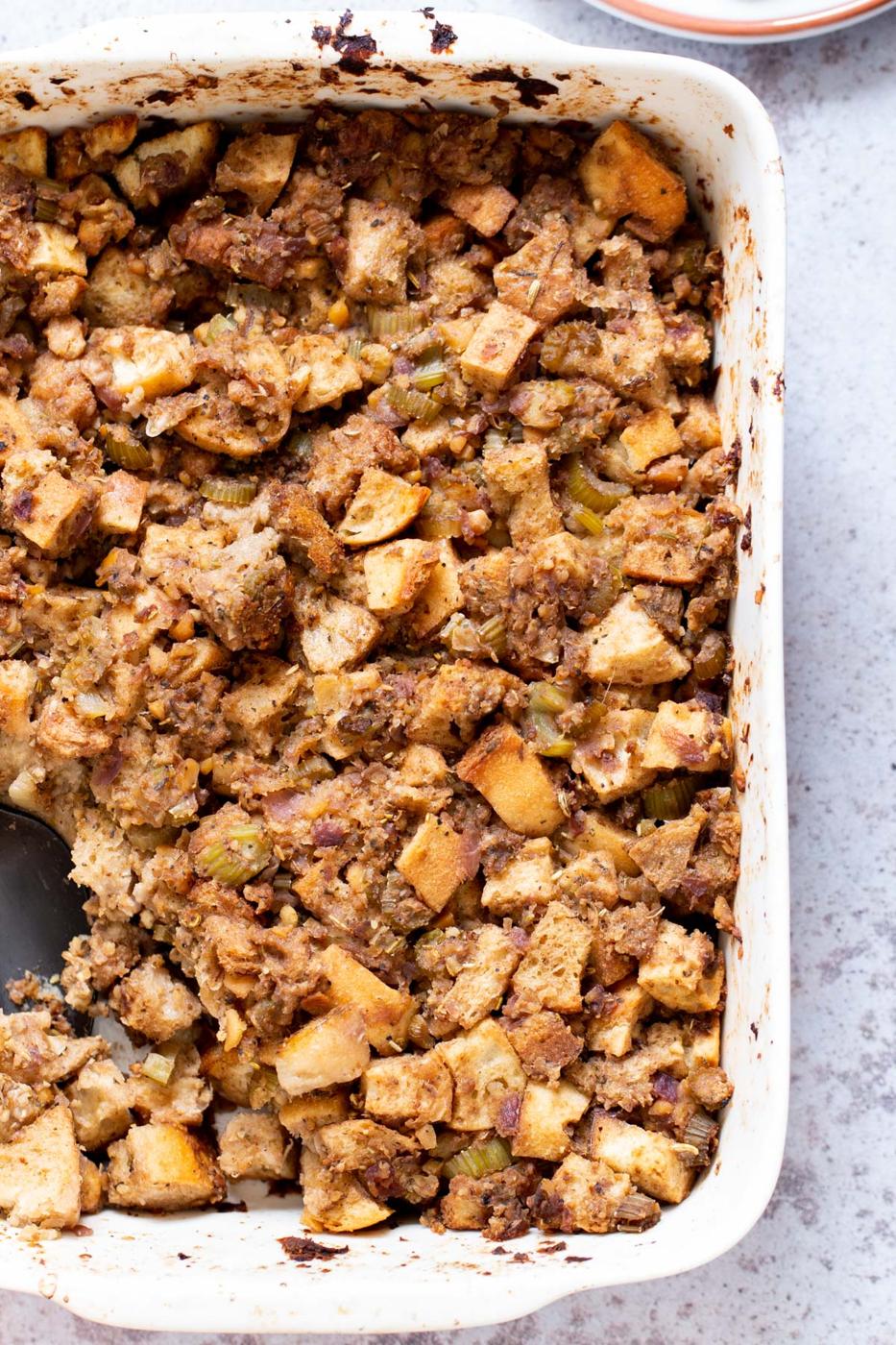 vegan stuffing in a white casserole dish