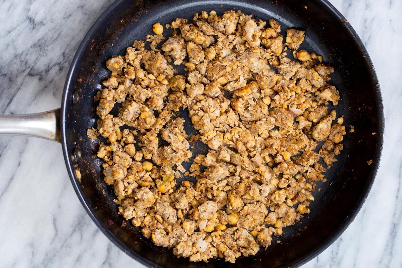 vegan chickpea stuffing in a sauteeing pan