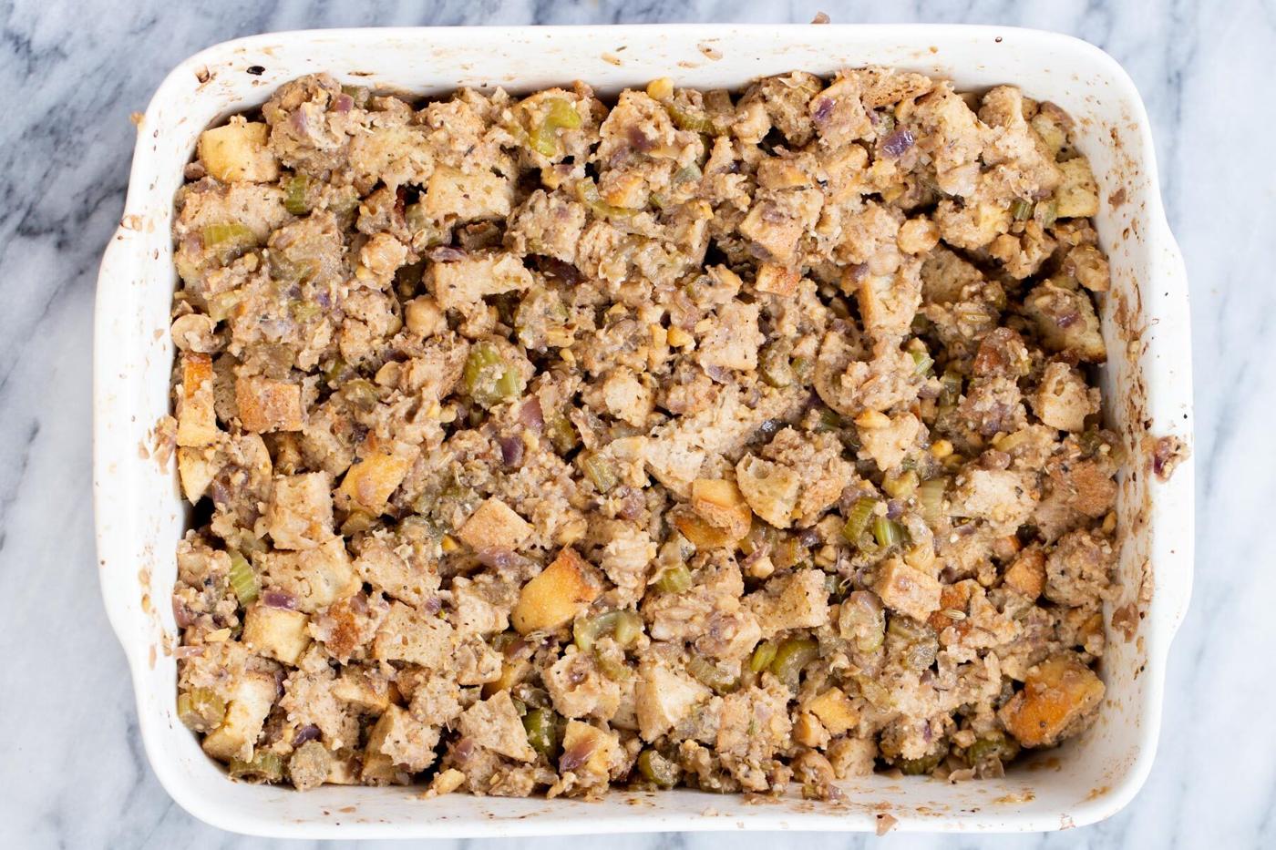 vegan stuffing in a white casserole dish