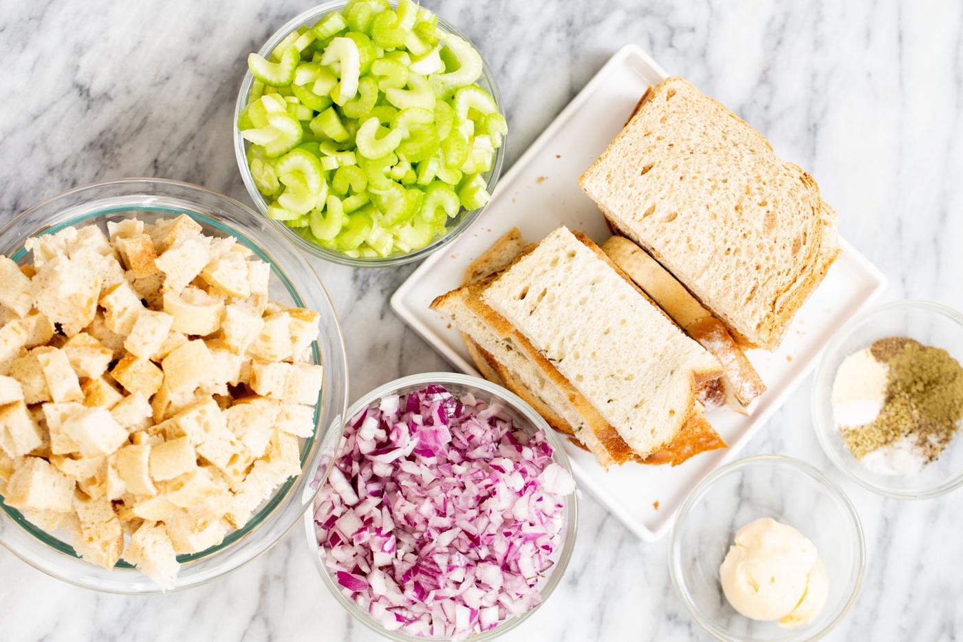 ingredients for vegan stuffing on a marble counter