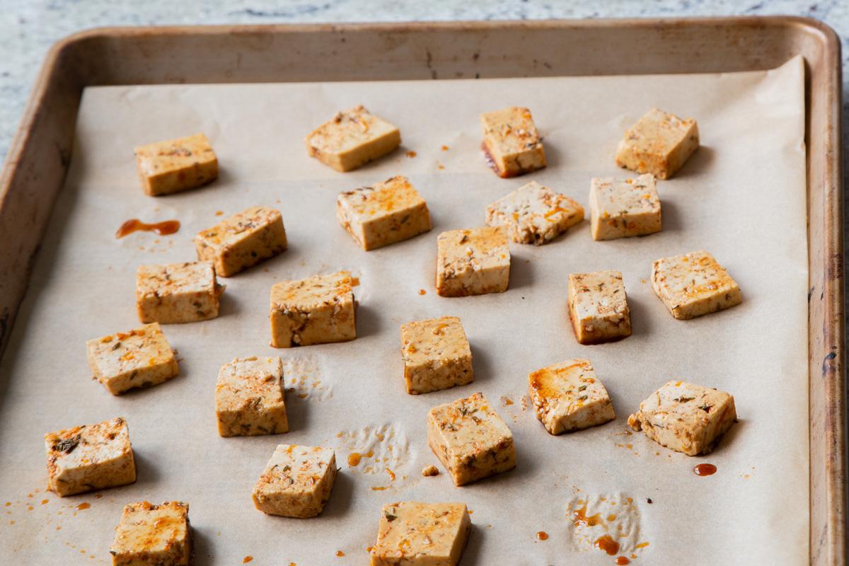 smoky tofu on the baking sheet before baking