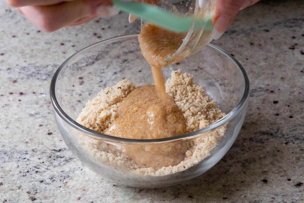 adding wet crouton ingredients to the dry ingredients