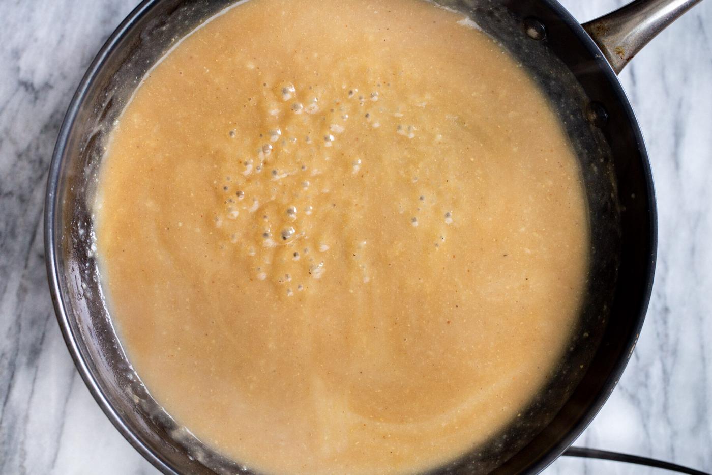 vegan mushroom gravy in a sauteeing pan