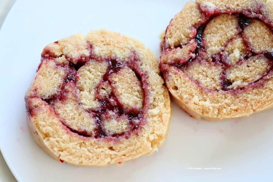 Vegan Swiss roll with Vegan Yellow cake and fruit preserves. Easy Swiss roll Cake | Pitzn
