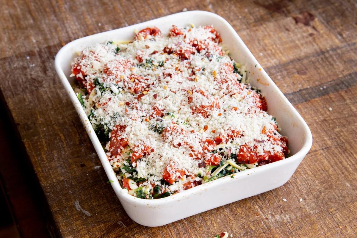 assembled tofu parmesan bake ready for the oven