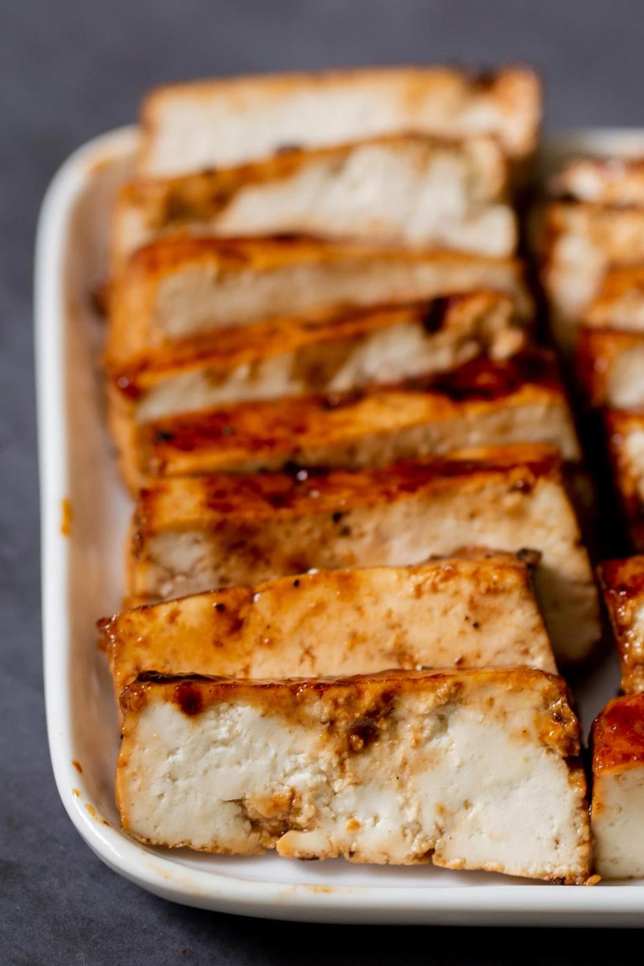 close-up of seared tofu slices on a plate