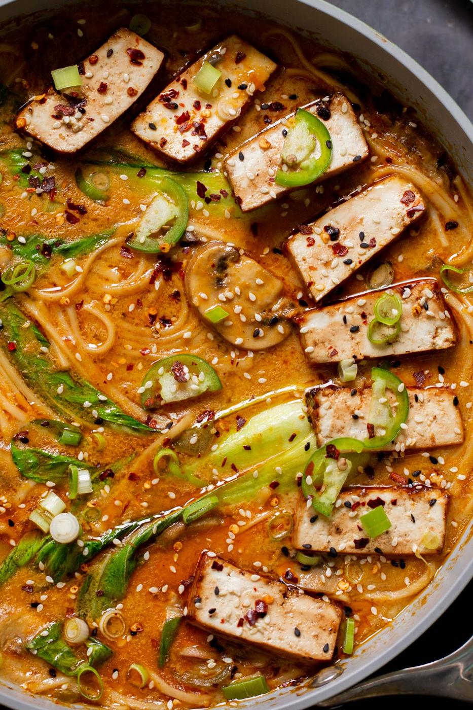 close-up of vegan tonkotsu in the pan after adding tofu and toppings