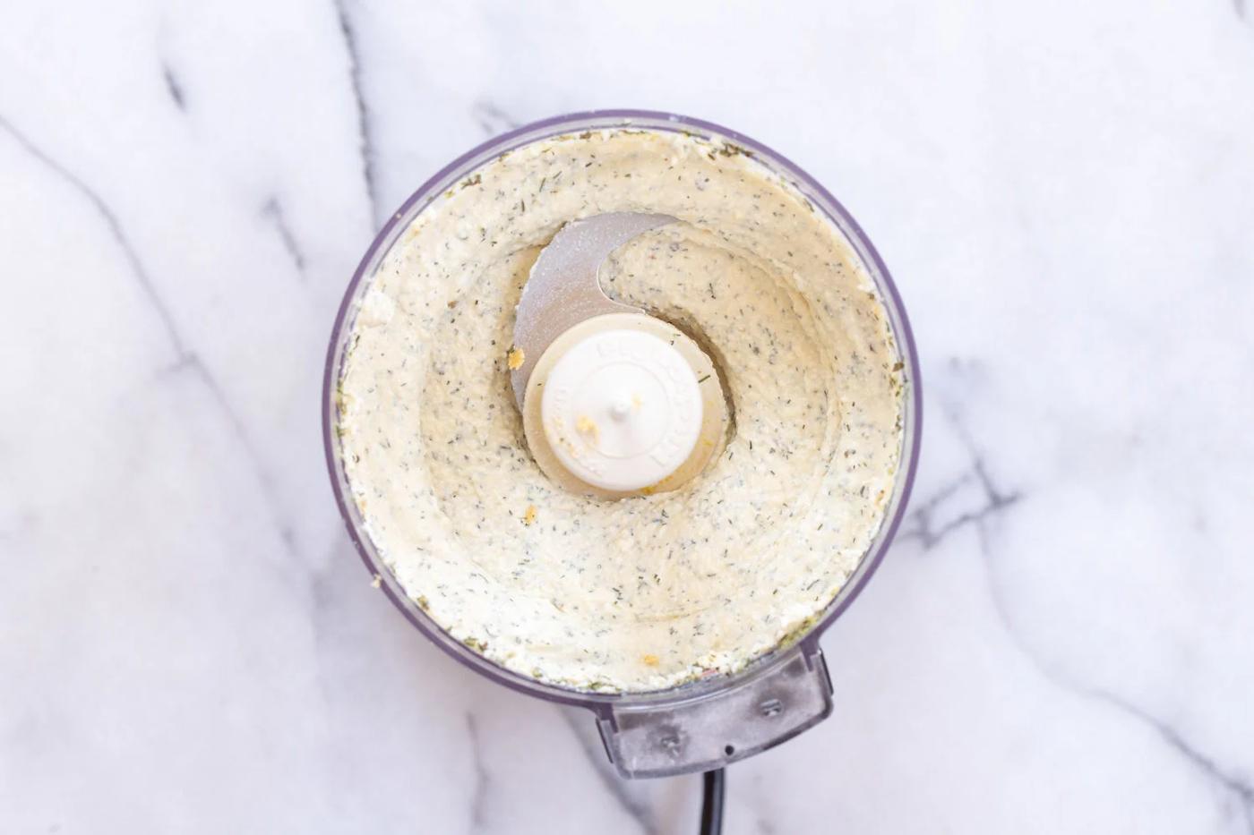 Dairy free herbed cream cheese blended in a food processor, for our Vegan Tortilla Roll ups recipe