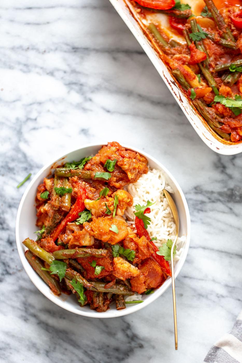 vegan vegetable casserole served with a side of rice