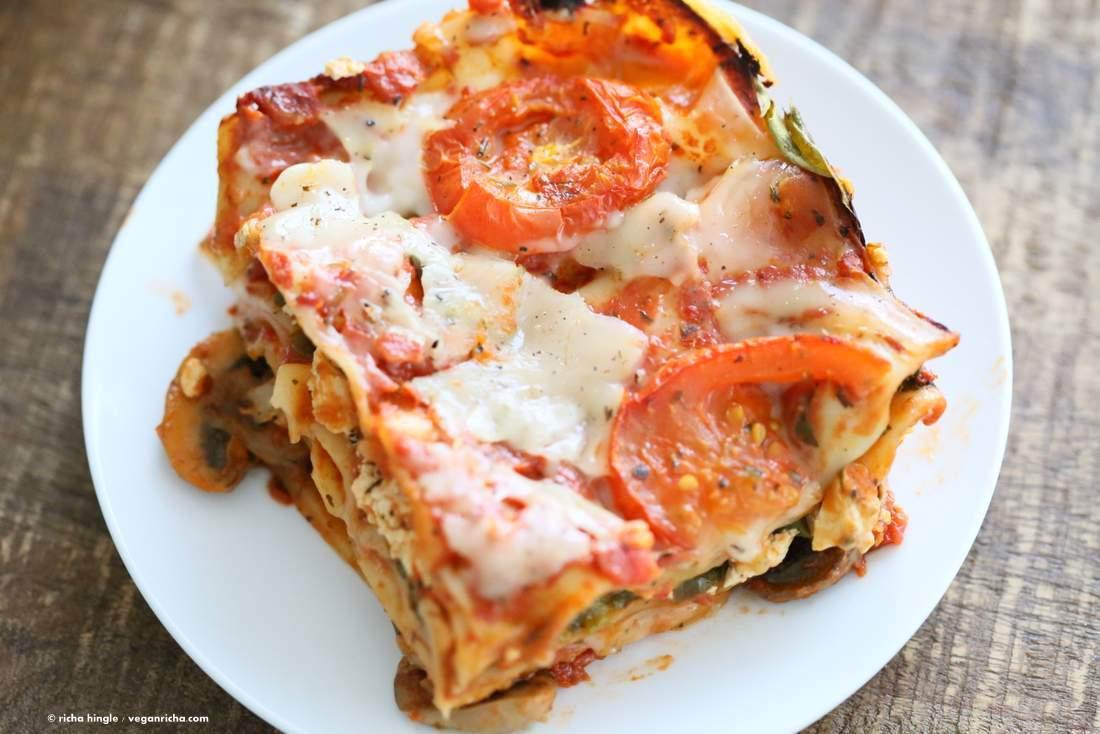 Vegan Veggie Lasagna. Easy Lasagna for 2 with herbed mushrooms, greens, tofu thyme ricotta, chao cheese slices . Vegan Recipe | VeganRicha.com