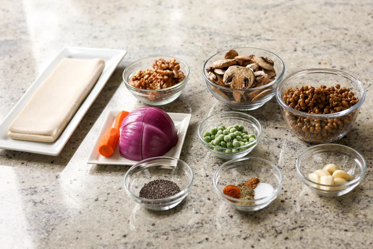 lentil Wellington ingredients in bowls on the kitchen counter