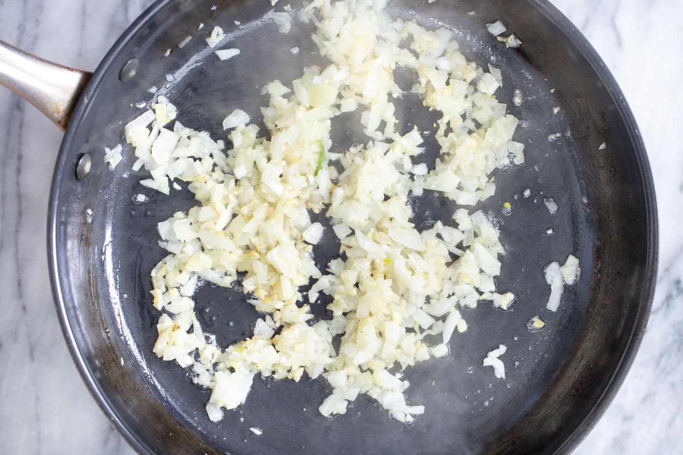 fried minced onion in a sauteeing pan