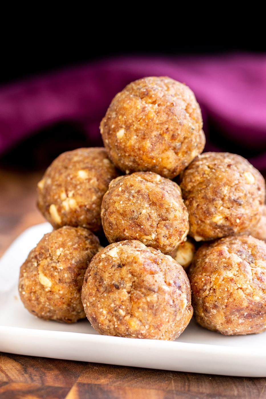 stacked Indian Date Ladoos on a white plate