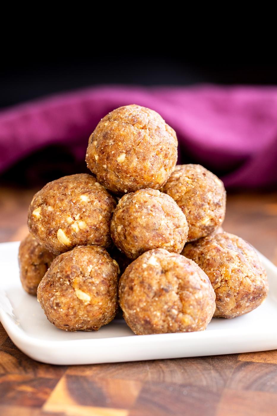 vegan whole wheat date ladoo on a small plate