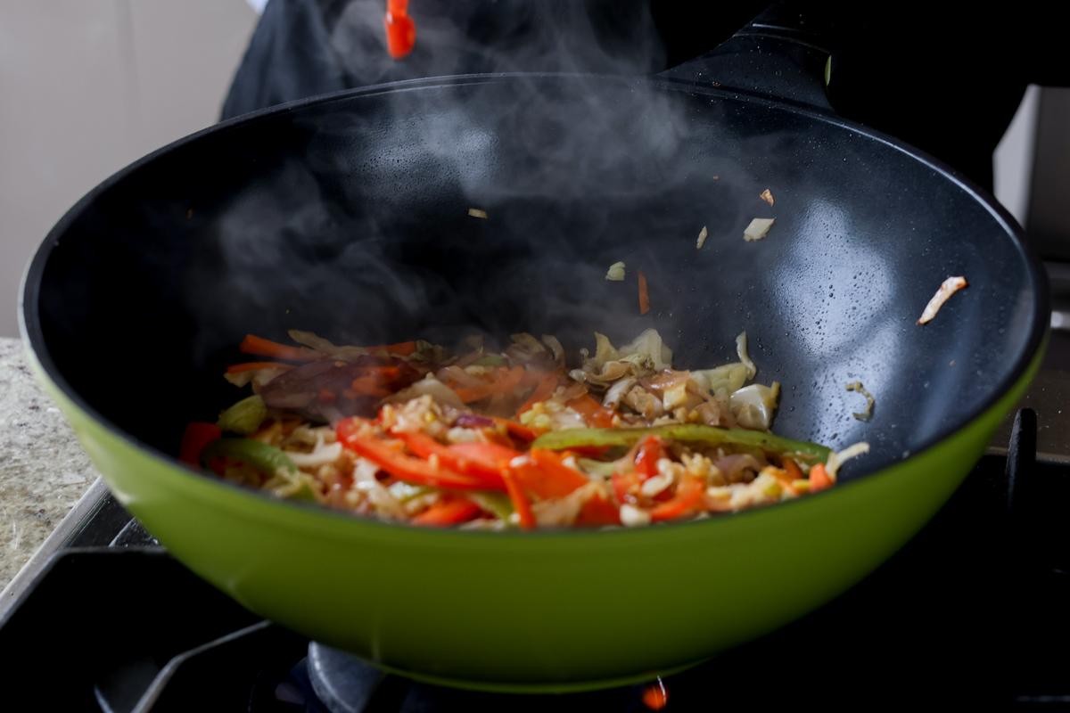 adding sauces to the pan