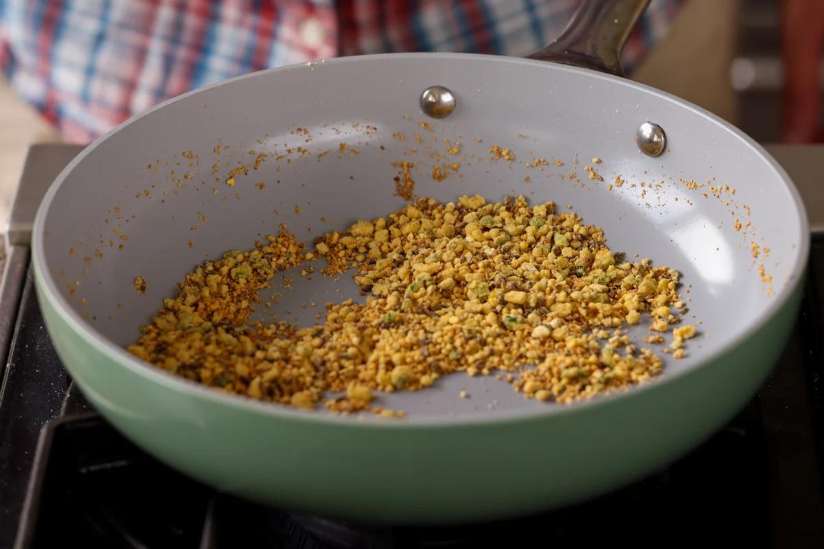 chickpea flour in the pan after roasting