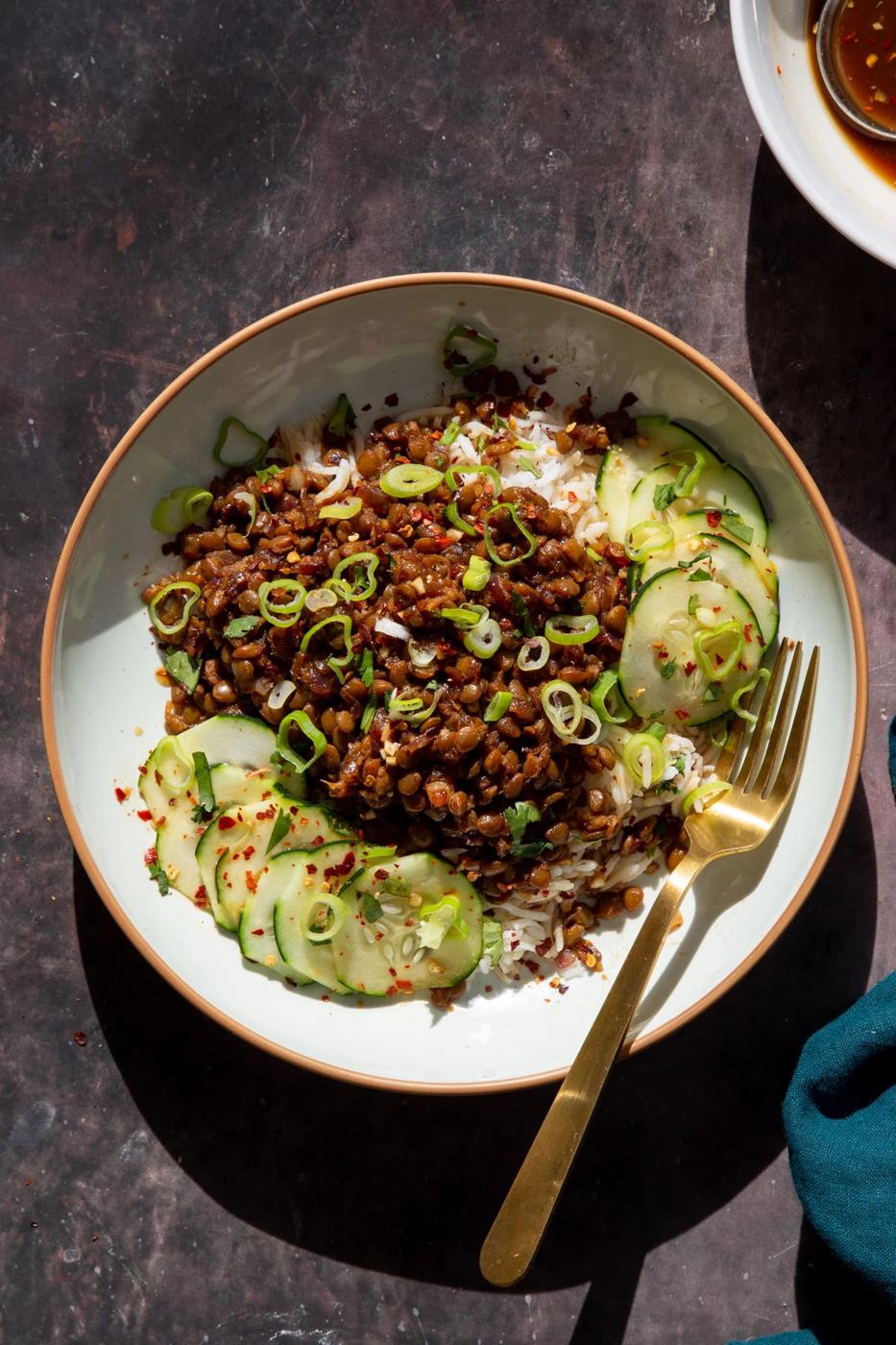 vegan vietnamese lentil pork bowls served with cucumber and rice