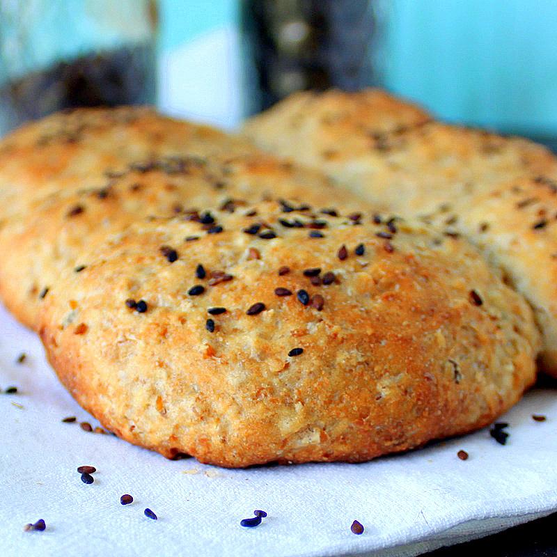 White Burger buns with some whole grains. Vegan