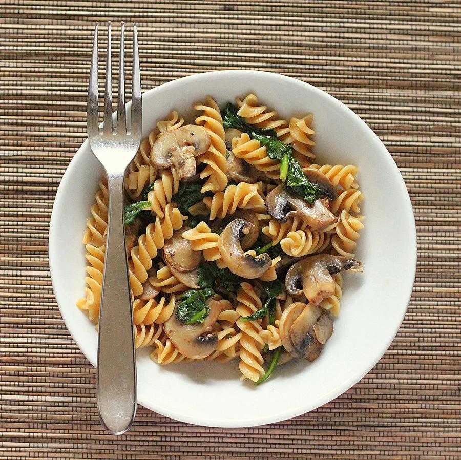 Whole Grain Fusilli with browned Mushrooms and Spinach. vegan
