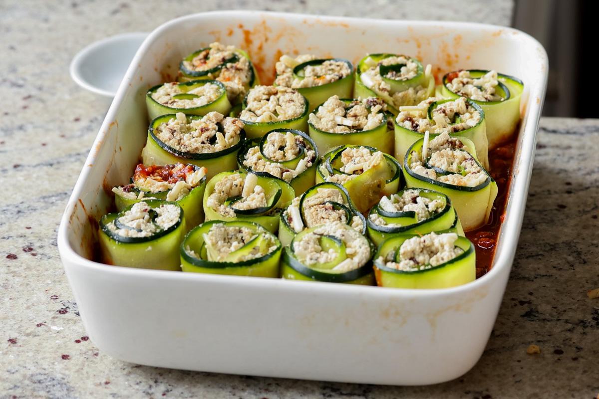 all of the zucchini rolls, arranged in the baking dish