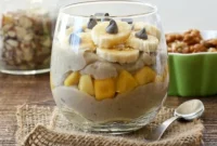 Creamy Tropical Bliss: Vegan Gluten-Free Brown Rice Pudding with Mango, Banana & Walnuts