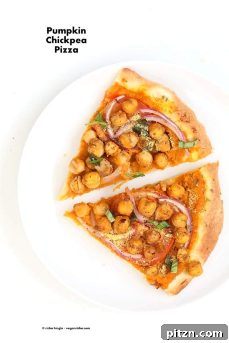 Golden Harvest Chickpea Pumpkin Pizza 2 Vibrant Chickpea Pumpkin Veggie Pizza with a rustic crust, topped with spicy chickpeas, fresh vegetables, and pepita parmesan.