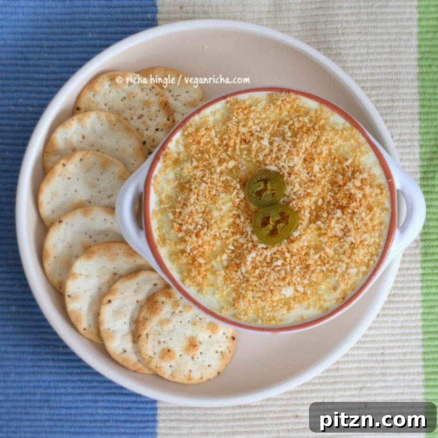 Vegan Jalapeno Popper and Havarti Dips Gluten Free Raw Options 8 A delicious bowl of Vegan Jalapeno Popper and Havarti Dip, garnished and ready to serve. This gluten-free and plant-based dip is perfect for any party. VeganRicha.com