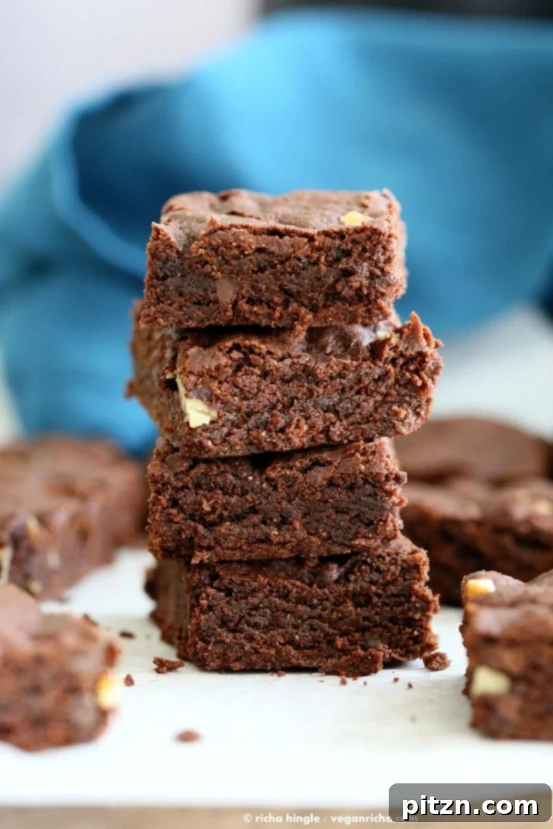 Easy Vegan Brownies Recipe. Fudgy, delicious. Add walnuts, peppermint, ginger, peanut butter swirl for variation | VeganRicha.com #vegan #brownie