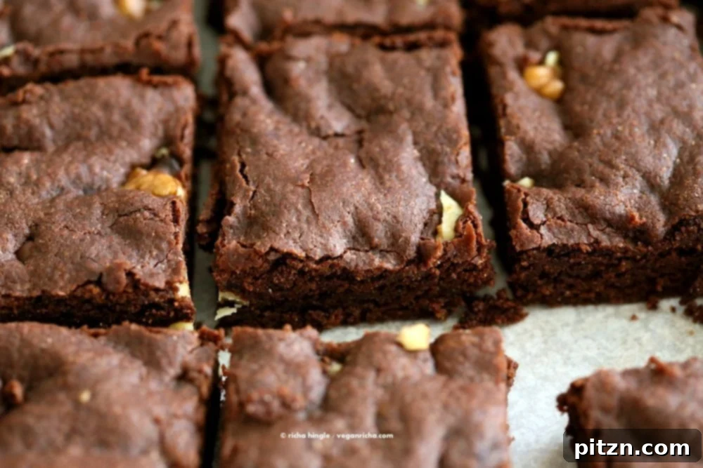 Easy Vegan Brownies Recipe. Fudgy, delicious. Add walnuts, peppermint, ginger, peanut butter swirl for variation | VeganRicha.com #vegan #brownie