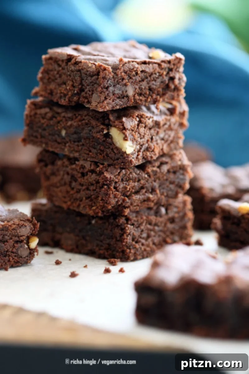 Easy Vegan Brownies Recipe. Fudgy, delicious. Add walnuts, peppermint, ginger, peanut butter swirl for variation | VeganRicha.com #vegan #brownie