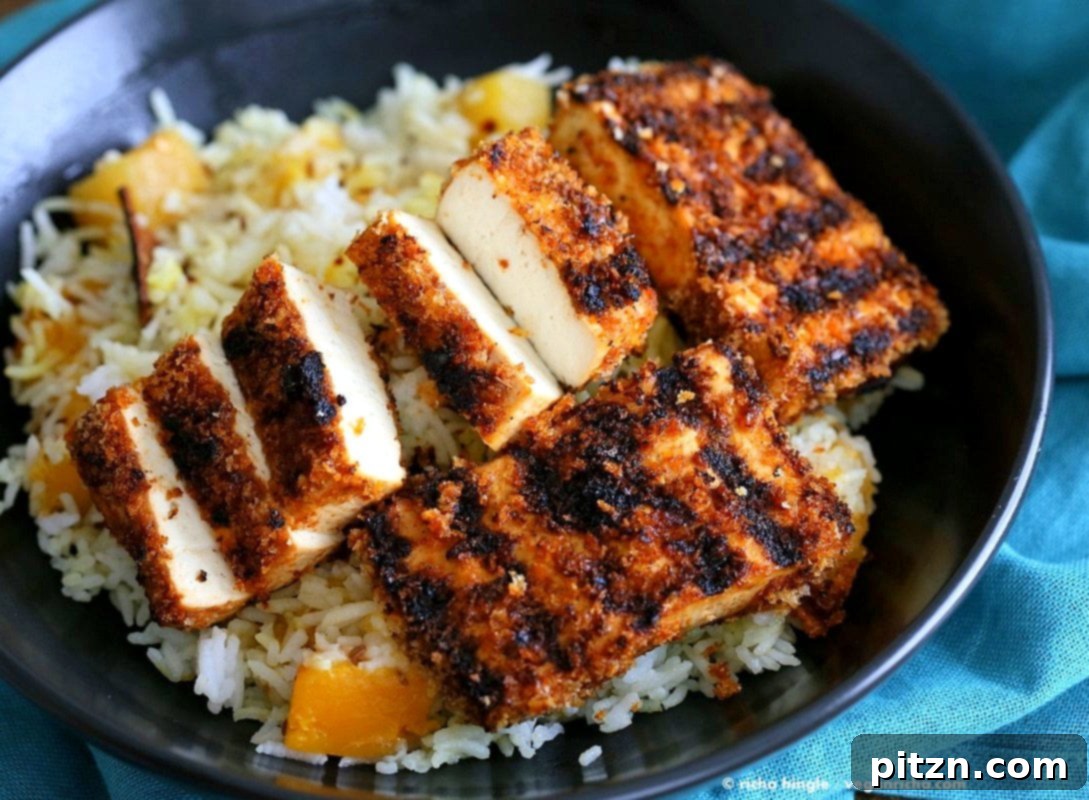 Golden Butternut Pilaf with Warming Spices 3 Butternut Squash Pilaf served with Breaded Crispy Tofu Strips. A delightful vegan and gluten-free pairing for a complete holiday meal. | VeganRicha.com #Vegan #Glutenfree #Holiday #side #Recipe