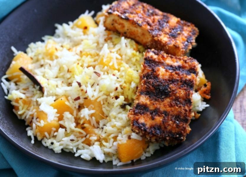 Butternut Squash Pilaf served with Crispy Breaded Tofu Strips, a delightful and healthy vegan meal.
