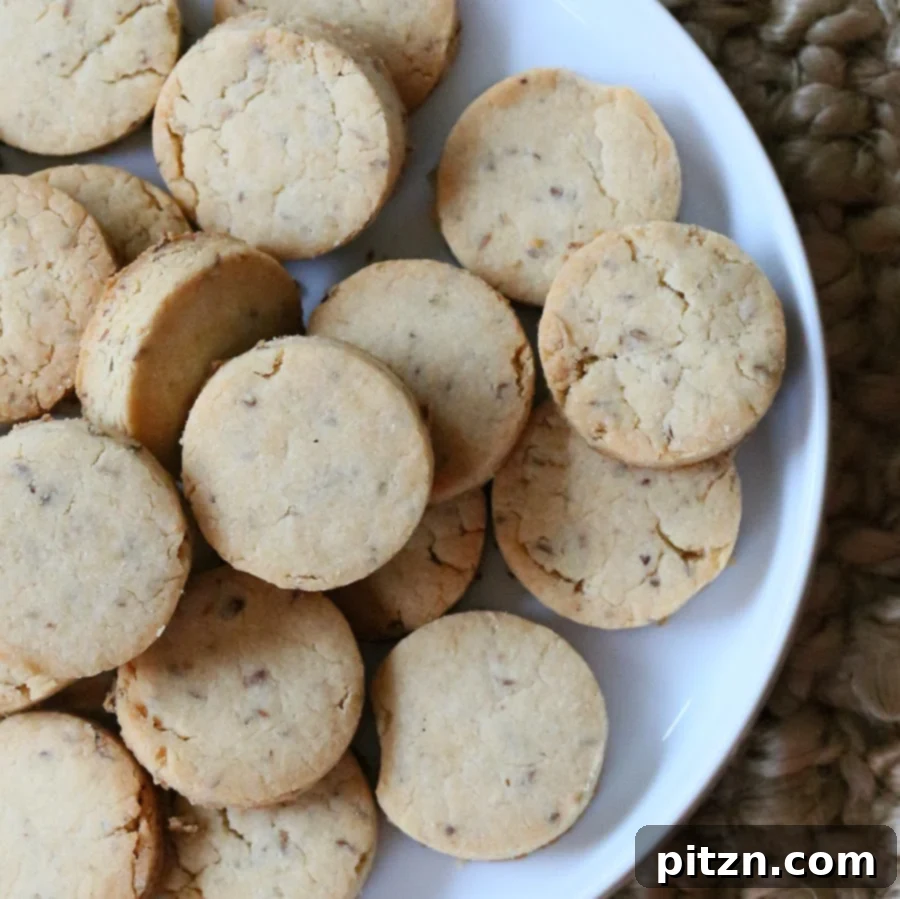 overhead shot of gluten-free vegan sugar cookies on a white cookie platter