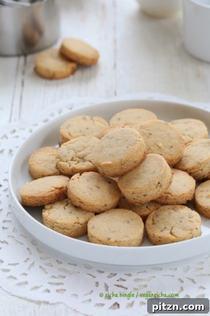 vegan sugar cookies on a white cookie plate