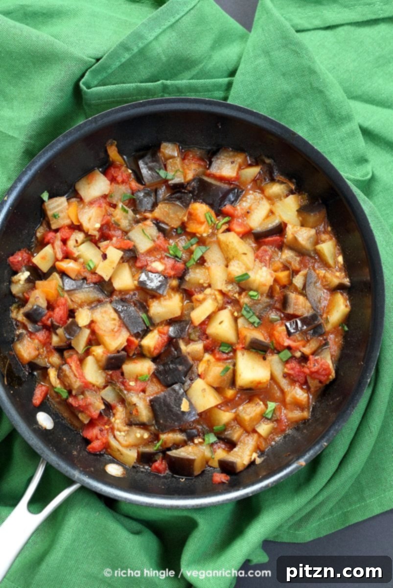Easy Indian spiced Eggplants and Potatoes. Aloo Baingan Recipe. Curried Potato Eggplant side. | VeganRicha.com #vegan #glutenfree #Indian #eggplant #potato
