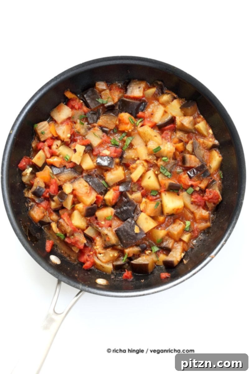 Easy Indian spiced Eggplants and Potatoes. Aloo Baingan Recipe. Curried Potato Eggplant side. | VeganRicha.com #vegan #glutenfree #Indian #eggplant #potato
