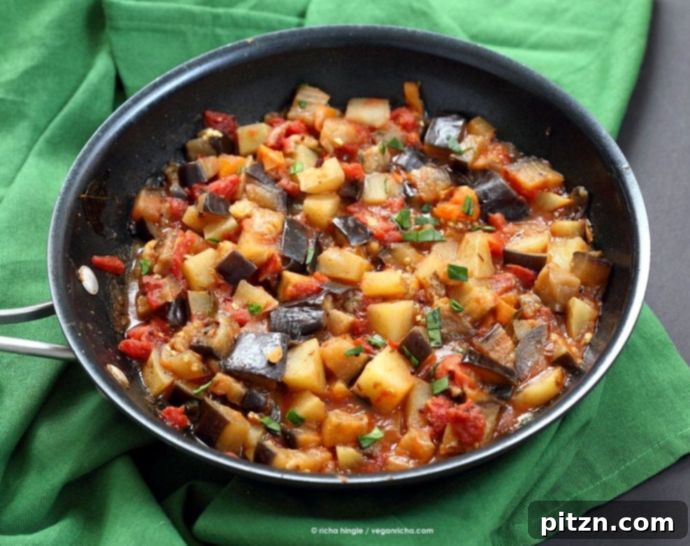 Easy Indian spiced Eggplants and Potatoes. Aloo Baingan Recipe. Curried Potato Eggplant side. | VeganRicha.com #vegan #glutenfree #Indian #eggplant #potato