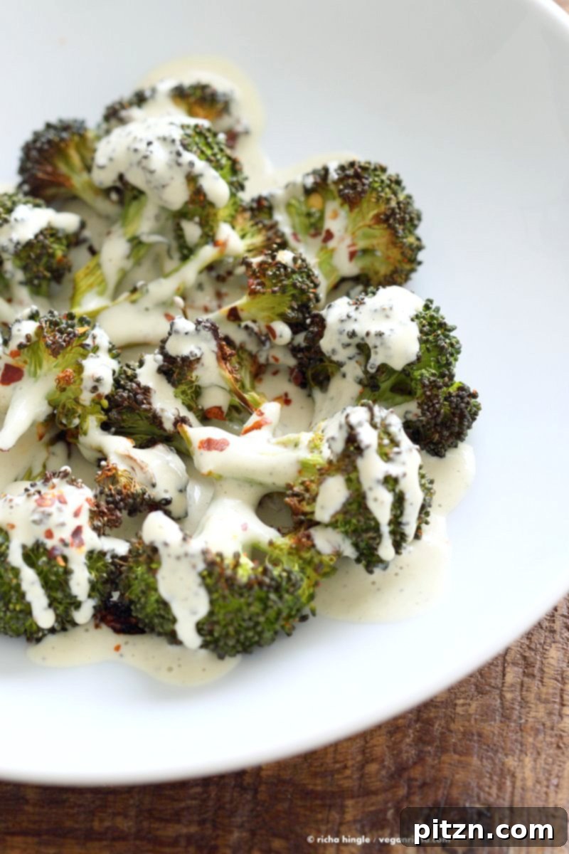 Crispy Roasted Broccoli with Zesty Basil Cream 5 Roasted Broccoli with Creamy Basil Dressing. Broccoli tossed in garlic, cayenne, and baked. Served with cheesy cashew basil sauce. Vegan Gluten-free soy-free Recipe | VeganRicha.com #vegan #glutenfree #soyfree