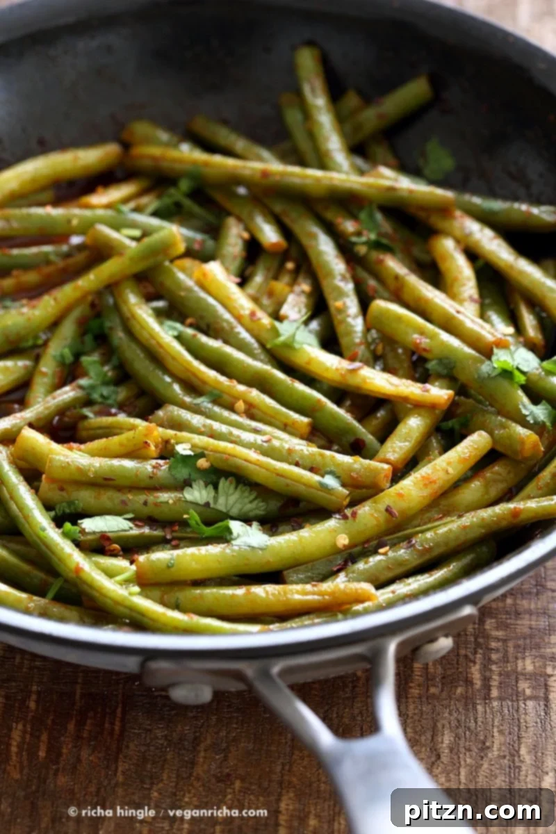 Red Curry Green Beans - Green Beans Stir fry with red curry paste, kaffir lime, sugar and chile. Pad Prik King Vegan Glutenfree Soyfree Recipe | VeganRicha.com