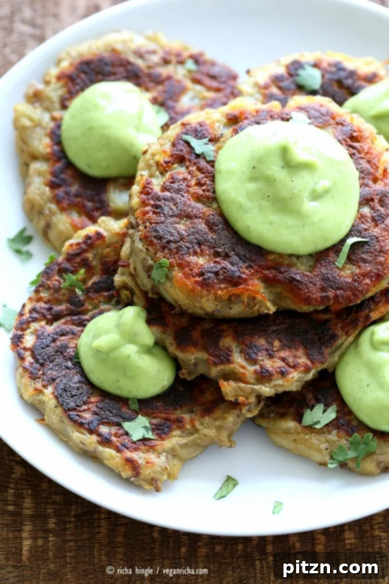 Boxty Irish Potato Cakes with Avocado Basil Ranch 7 A beautifully presented Traditional Vegan Irish Boxty Potato Cake, garnished with fresh herbs and a generous drizzle of avocado basil garlic ranch dressing. A healthy, soy-free, and vegan recipe.