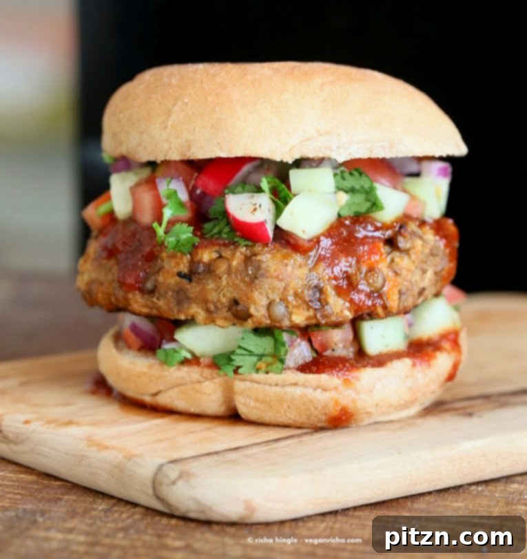 Homestyle Lentil Quinoa Burgers 3 Close-up of golden-brown Lentil Quinoa Meatloaf Burgers, showcasing their appealing texture and a rich, spicy glaze. Perfect vegan and nut-free burger patties. VeganRicha.com