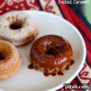 Wholesome Baked Vegan Sweet Potato Doughnuts 2 overhead shot of glazed baked vegan sweet potato donuts on a white plate
