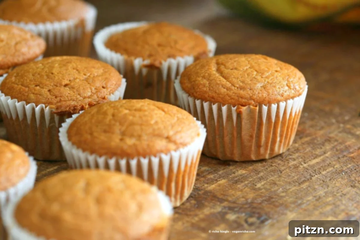 Luscious One-Bowl Vegan Mango Cupcakes 5 A tray of freshly baked One Bowl Vegan Mango Cupcakes, ready for frosting and serving.