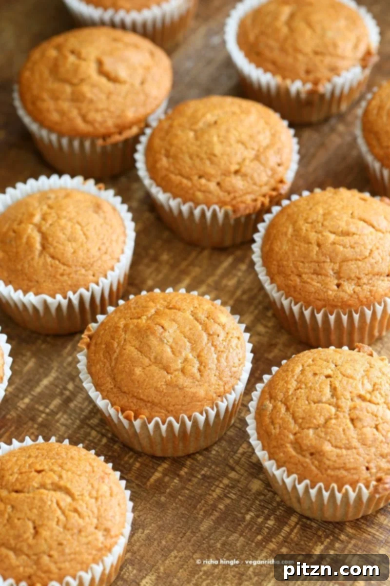 Luscious One-Bowl Vegan Mango Cupcakes 8 A beautifully arranged stack of One Bowl Vegan Mango Cupcakes, ready to be enjoyed as a refreshing tropical dessert.