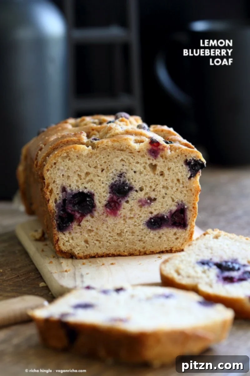 Deliciously moist Vegan Lemon Blueberry Pound Cake loaf, perfect for breakfast or dessert, with a zesty lemon glaze.