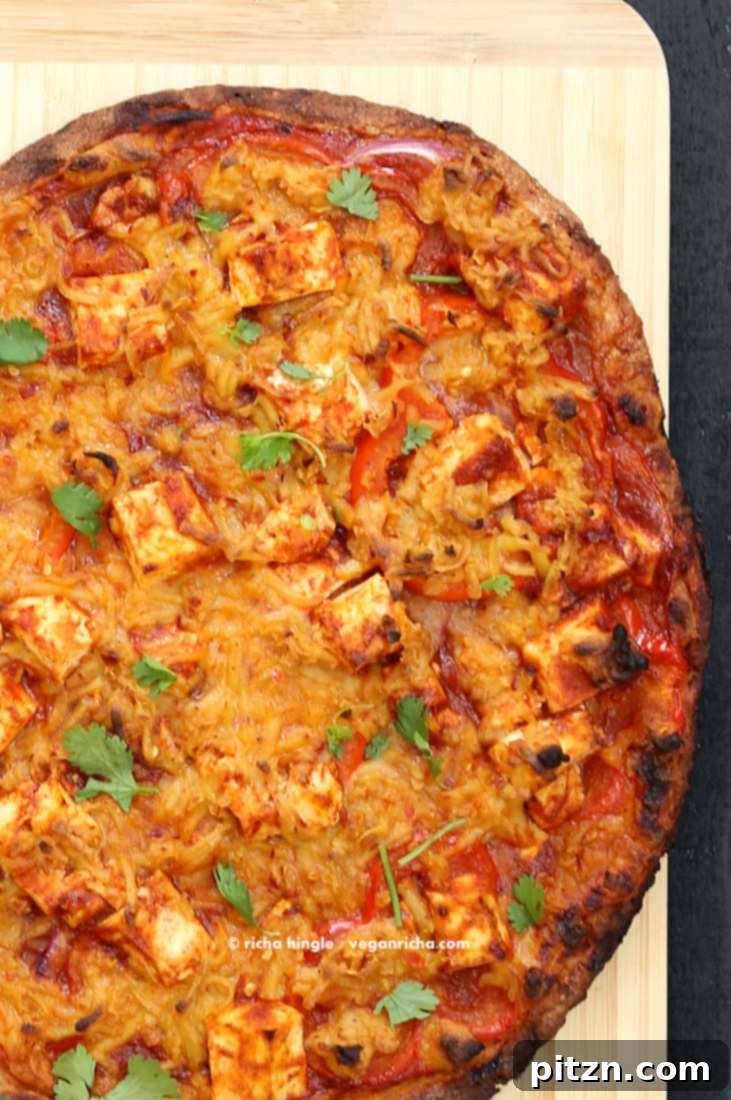 Fiery Vegan Sriracha BBQ Tofu Pizza with Zesty Pepper Jack on Spelt Crust 3 Close-up of a freshly baked Vegan BBQ Tofu Pepper Jack Cheese Pizza.