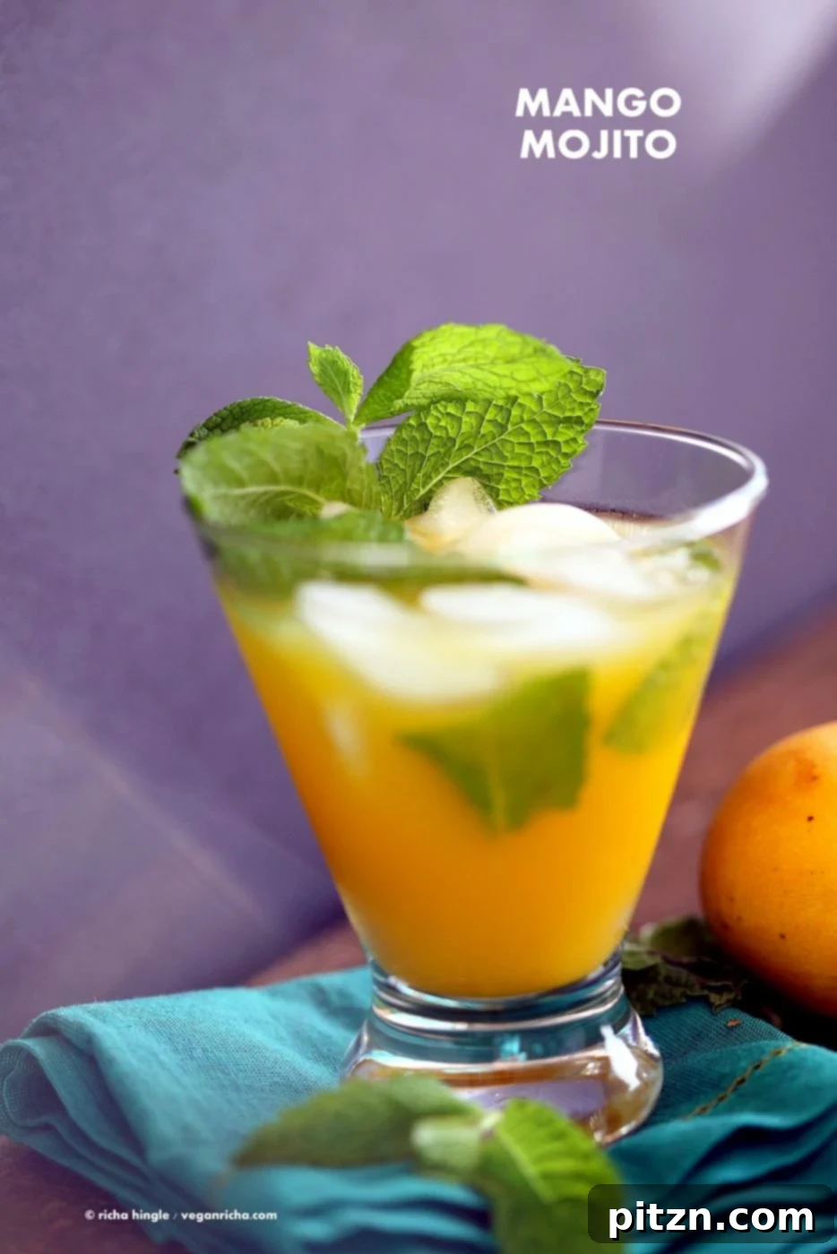 Vibrant and refreshing mango mojito, perfect for summer parties and outdoor gatherings. This vegan, gluten-free, soy-free, and nut-free drink features fresh mint, zesty lime, and sweet mango puree.